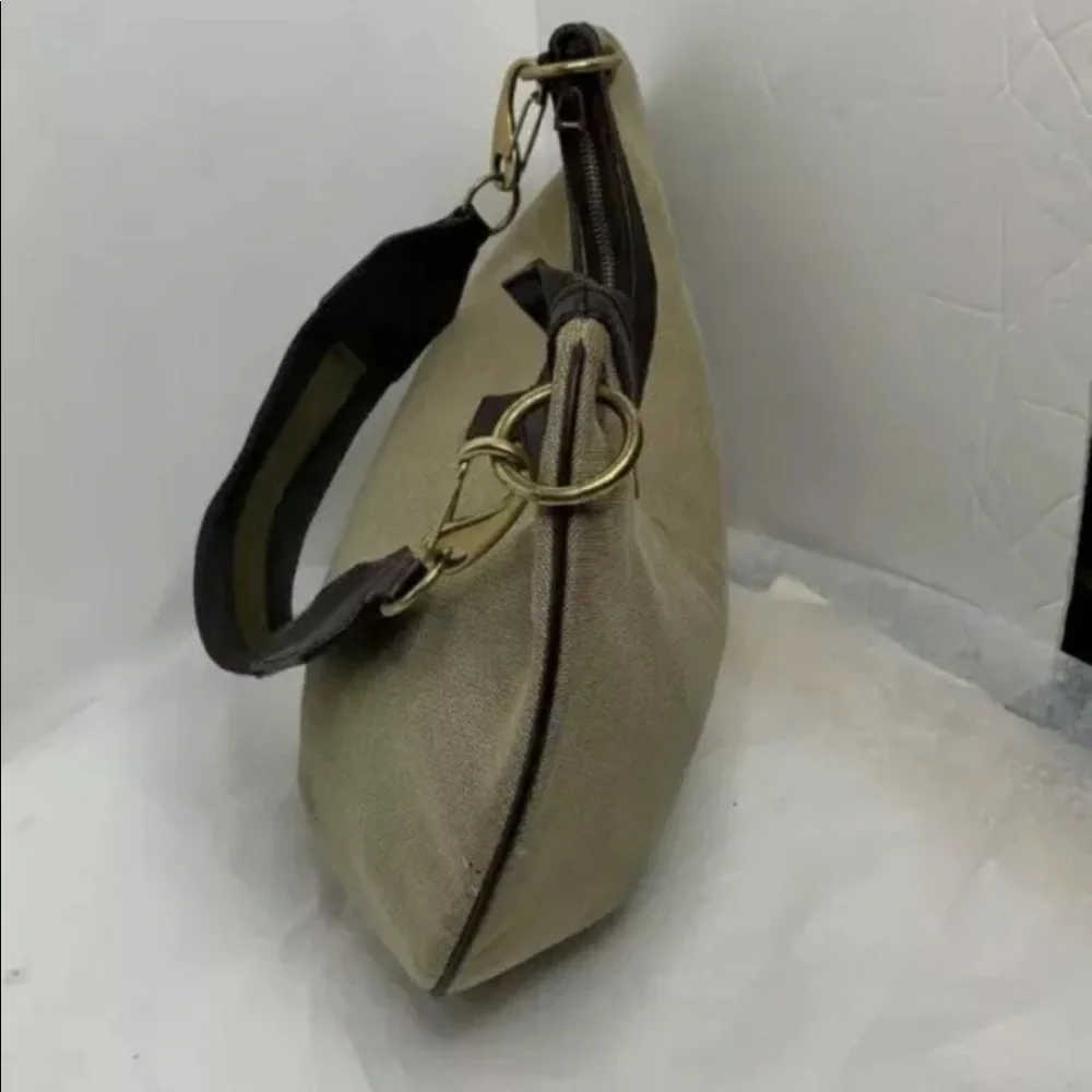 Gucci crescent handbag comes with COA